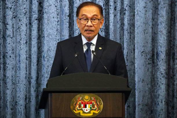Malaysia prime minister Anwar Ibrahim speaks during a press conference on 5 November 2023 (AFP via Getty Images)