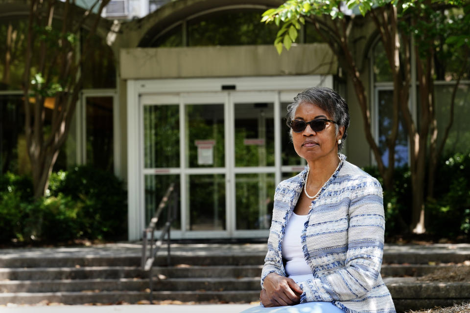 Hattie Whitehead Thomas poses for a portrait on the campus of the University of Georgia in Athens, Ga., on Thursday, May 6, 2021, where a Black neighborhood was razed in the 1960's to make room for dorms. The 72-year-old Athens resident grew up in the destroyed Linnentown neighborhood. “UGA has got to do more. It’s got to come to the table and acknowledge what it did,” she says. (AP Photo/John Bazemore)