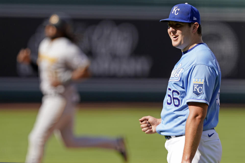 Kansas City Royals starting pitcher Brad Keller reacts after a baseball game against the Pittsburgh Pirates Sunday, Sept. 13, 2020, in Kansas City, Mo. Keller pitched a complete game and shut out the Pirates. (AP Photo/Charlie Riedel)