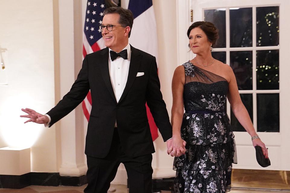 WASHINGTON, DC - DECEMBER 01: Comedian Stephen Colbert and his wife Evelyn McGee-Colbert arrive for the White House state dinner for French President Emmanuel Macron at the White House on December 1, 2022 in Washington, DC. The official state visit is the first for the Biden administration. (Photo by Nathan Howard/Getty Images)