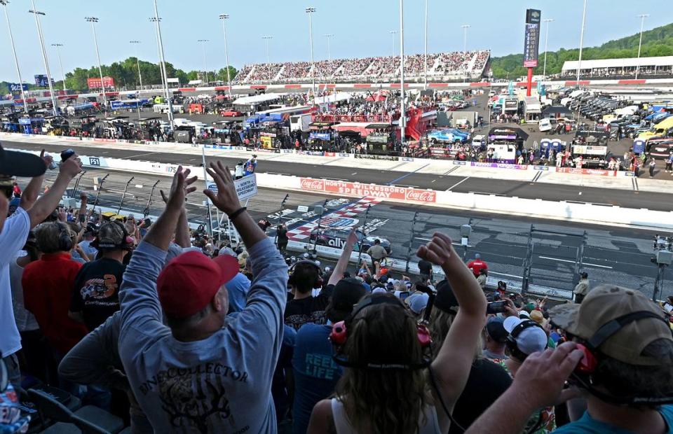 NASCAR fans cheer driver Josh Berry as he crosses the finish line to win the All-Star Open race at North Wilkesboro Speedway on Sunday, May 21, 2023.