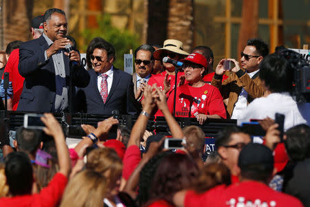 The Reverend Jesse Jackson speaks at the Wall of Tacos demonstration in front of the Trump International Hotel Las Vegas before the last 2016 U.S. presidential debate in Las Vegas, Nevada, U.S., October 19, 2016. REUTERS/Jim Urquhart