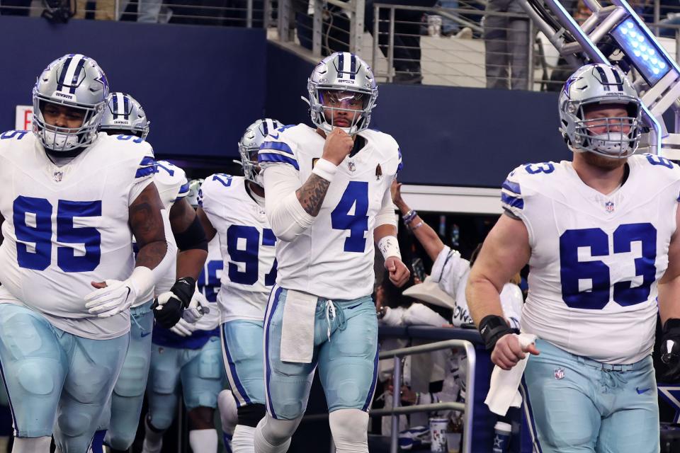 Dallas Cowboys quarterback Dak Prescott (4) takes the field against the Green Bay Packers for the 2024 NFC wild card game at AT&T Stadium.
