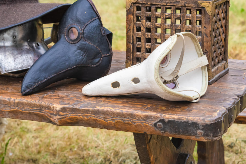 Medieval European hats and masks as an illustrative photo.