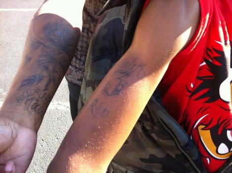 Chuntera Napier and her son Gaquan show off the tattoos. Would you let your 10-year-old get one?