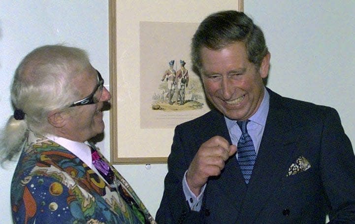 Jimmy Savile shared a joke with Prince Charles, patron of the British Forces Foundation, at a reception at the Army Staff Collage, Sandhurst, in 1999 - Tim Ockenden/PA