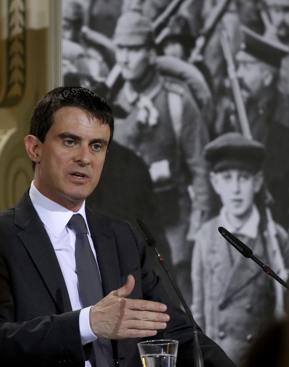 Prime Minister of France Manuel Valls delivers a speech during a 100 Years World War I remembrance event of the German Social Democratic Party, SPD, in Berlin, Germany, Monday, April 14, 2014. (AP Photo/Michael Sohn)