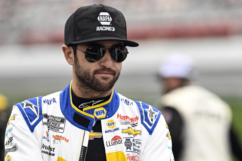 FILE - Chase Elliott looks on prior to a NASCAR Cup Series auto race at Charlotte Motor Speedway, Monday, May 29, 2023, in Concord, N.C. Elliott says he can’t rely on repeating last summer’s success, starting with his home track at Atlanta Motor Speedway, as his path to NASCAR’s playoffs. Elliott (AP Photo/Matt Kelley, File)