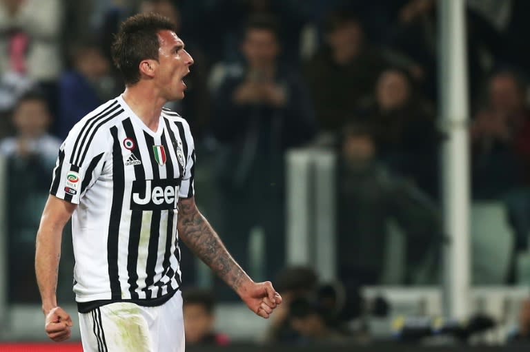 Juventus' forward Mario Mandzukic from Croatia celebrates after scoring during the Italian Serie A football match against Empoli on April 2, 2016