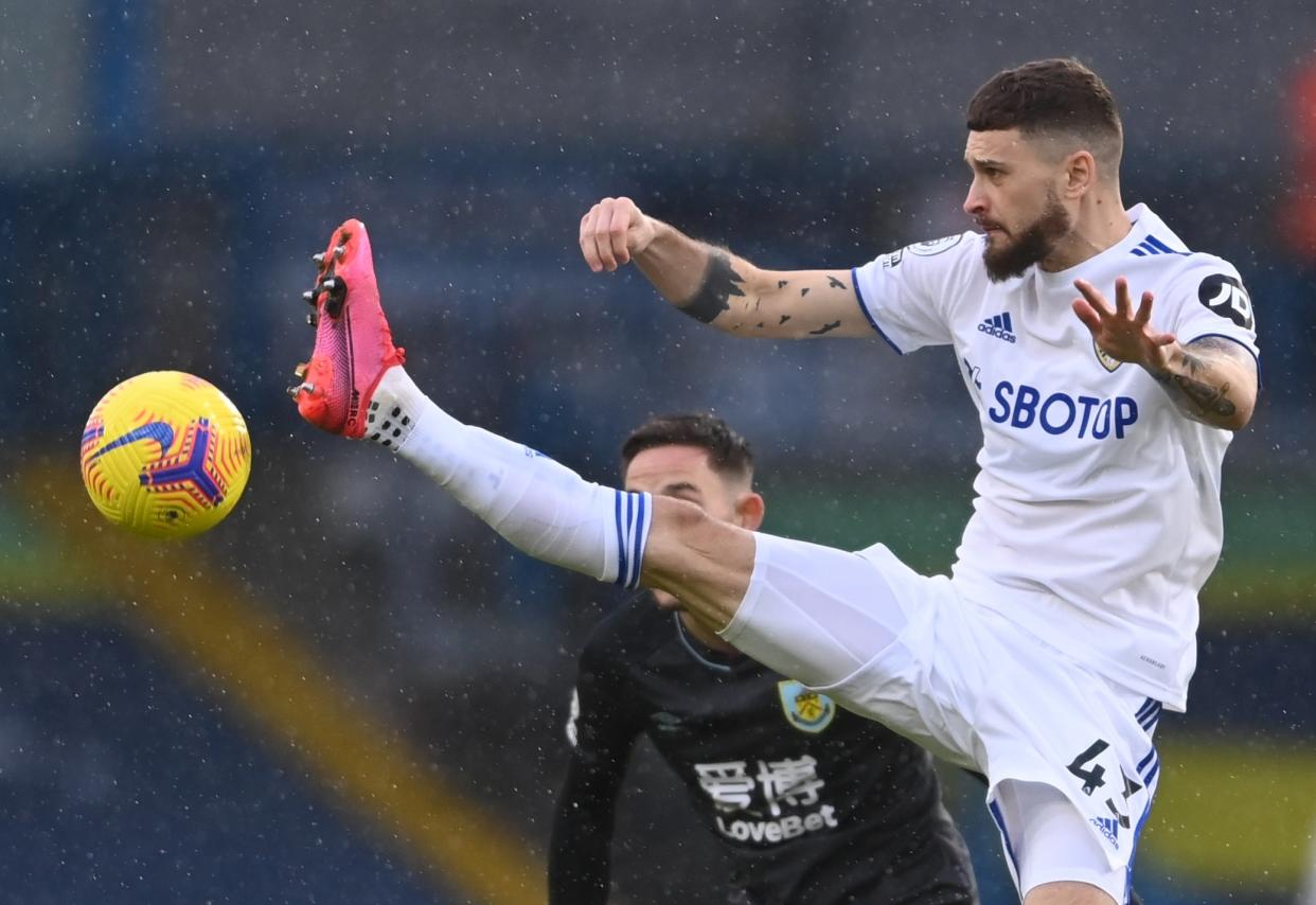 Mateusz Klich challenges for the ball in midfield (Pool via REUTERS)