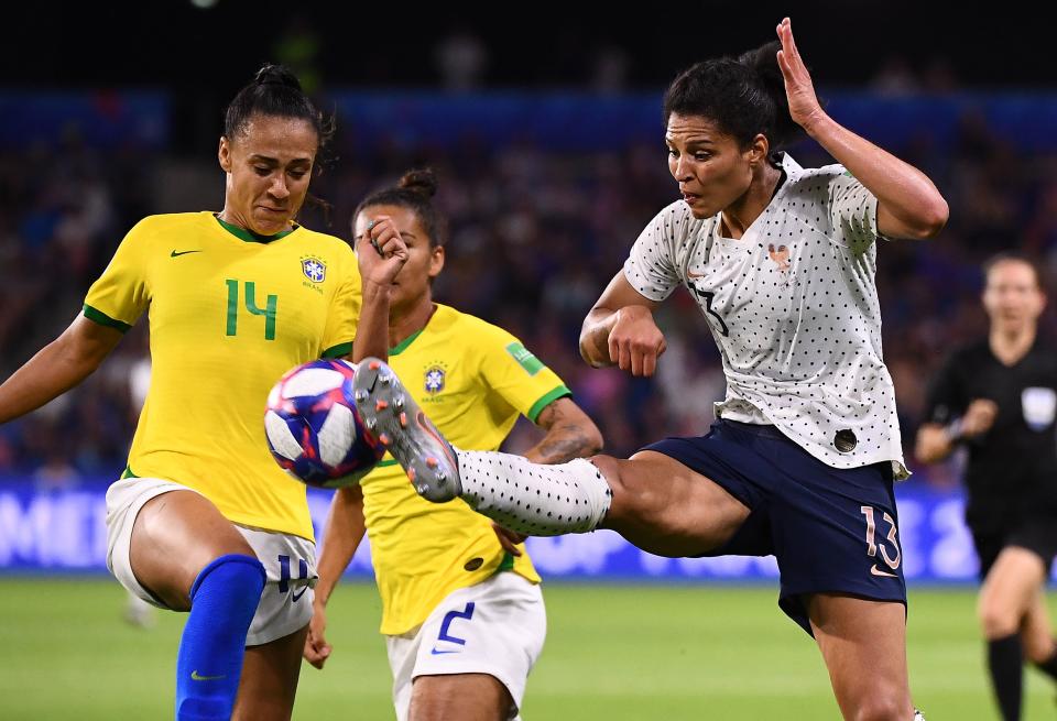 France's midfielder Valerie Gauvin (R) vies with Brazil's defender Kathellen during the France 2019 Women's World Cup round of sixteen football match between France and Brazil, on June 23, 2019, at the Oceane stadium in Le Havre, north western France. (Photo by FRANCK FIFE / AFP) (Photo credit should read FRANCK FIFE/AFP/Getty Images)