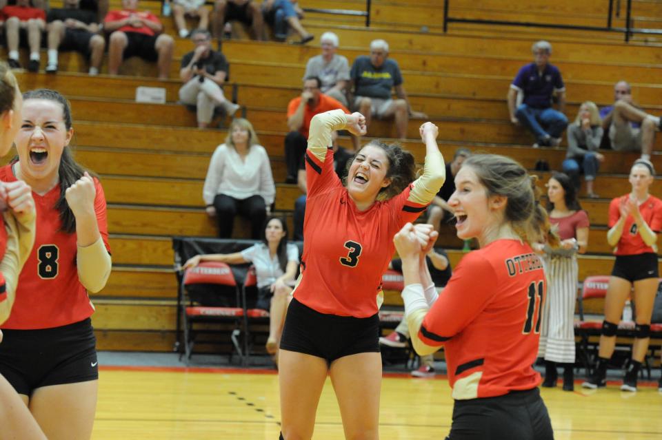 Pleasant grad Carlie Craycraft celebrates during an Otterbein volleyball match earlier in her career. Craycraft was recently named first-team All-Ohio Athletic Conference, becoming a four-time all-leaguer and she set the school's all-time assists mark as a setter.