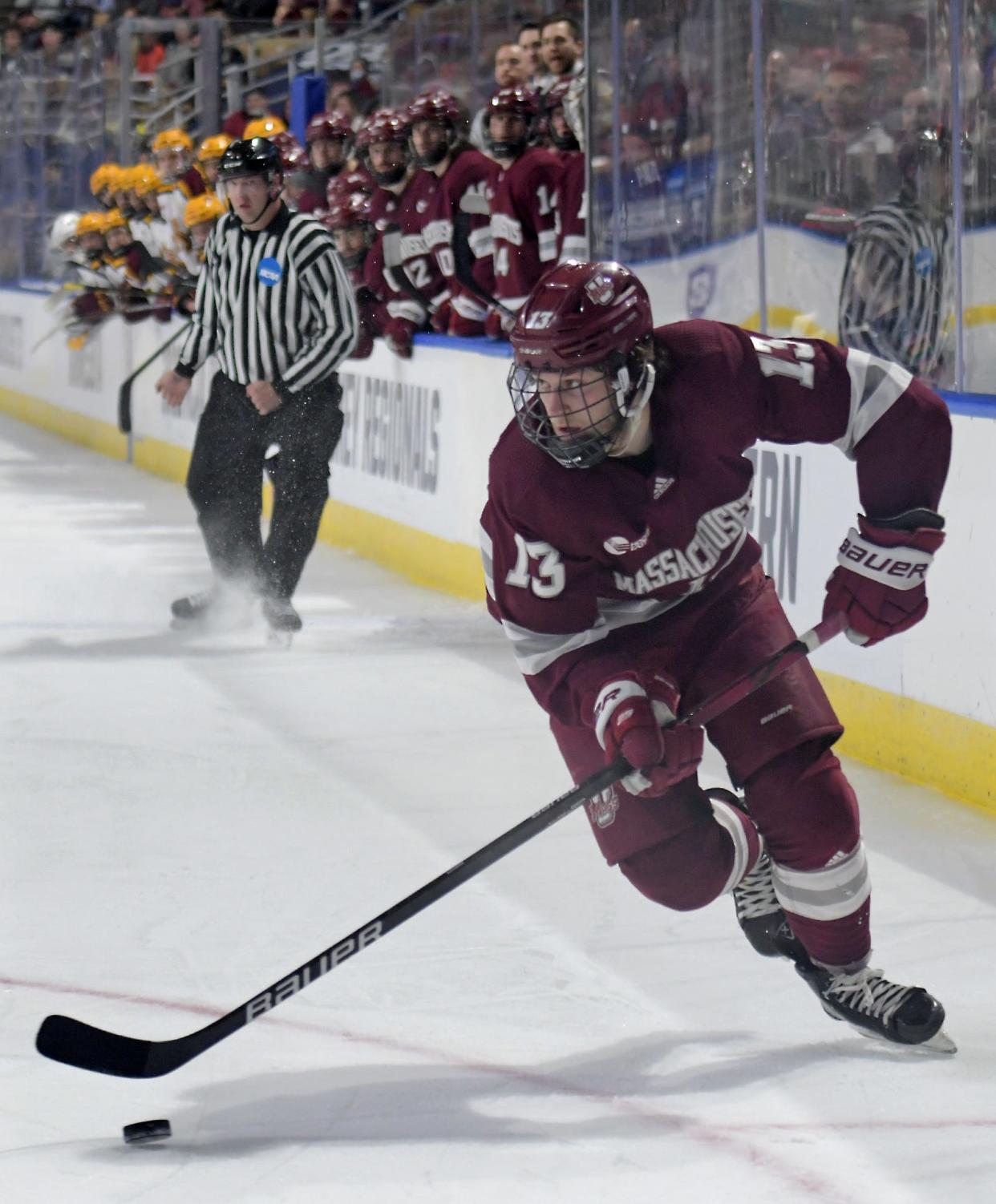 Reed Lebster, shown carrying the puck in a game against Minnesota, announced on Twitter this week that he's transferring to Michigan State.