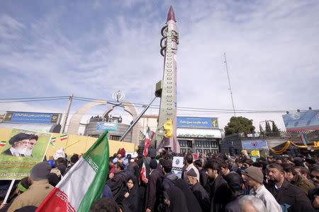 FILE PHOTO: Iranian-made Emad missile is displayed during a ceremony marking the 37th anniversary of the Islamic Revolution, in Tehran February 11, 2016. REUTERS/Raheb Homavandi/File Photo