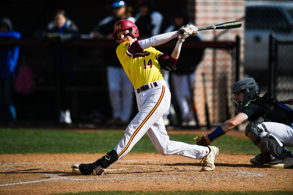 Rocky Mountain's Ross Frank (14) takes a swing during a high school baseball game against Poudre at Rocky Mountain High School in Fort Collins on April 20, 2023.