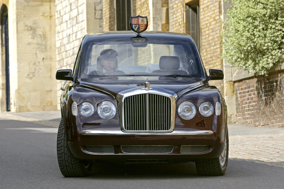 The new Bentley state limousine which is to be presented to Her Majesty. The Bentley is a Golden Jubilee gift to The Queen by a British based consortium of automotive manufacturing and service companies. The new addition is painted in claret livery below the waist rails and black above, and like other of The Queen's official cars, has no registration plate