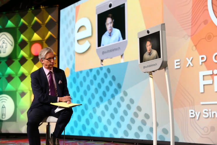 Bob Pisani of CNBC (L) speaks to Ray Kurzweil, who beamed in from San Francisco. (Singularity University)