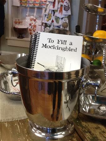 A cookbook is shown for sale in the gift shop at the Monroe County Heritage Museum in Monroeville, Alabama October 23, 2013. Harper Lee, the 87-year-old author of the still-popular 1960 bestseller, "To Kill a Mockingbird", recently filed a lawsuit against the museum dedicated to her novel in a dispute over a merchandising trademark. Photo taken October 23, 2013. REUTERS/Verna Gates