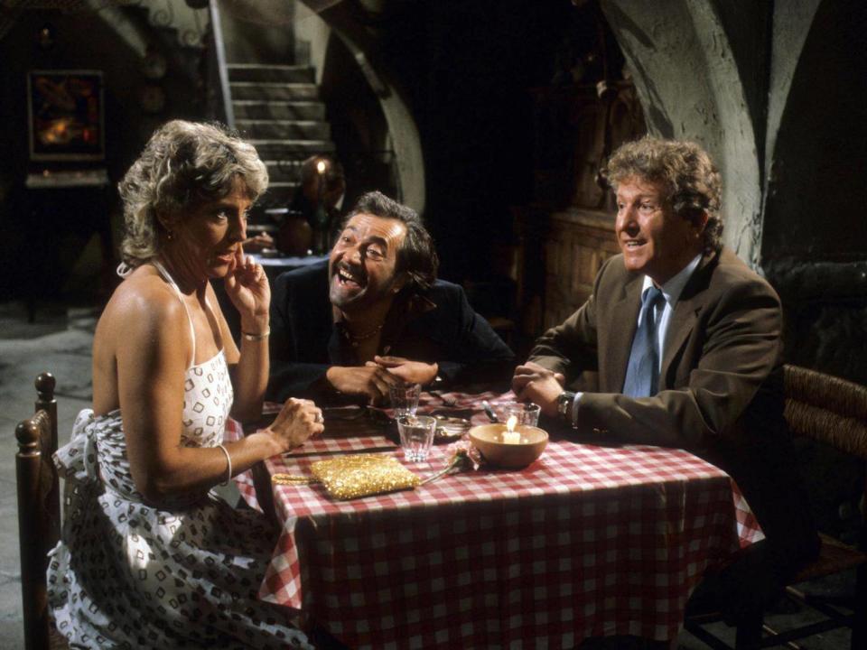 In the role for which he is best loved, with Joanna Van Gyseghem and Frank Coda in 'Duty Free' (ITV/REX)