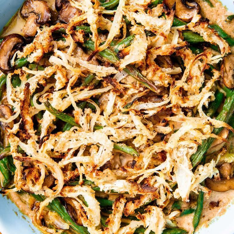 <p>Green bean casserole may be one of the most classic casseroles out there. This version swaps in vegan ingredients like almond milk for a recipe that stands up to the traditional but with a light, plant-based spin. </p><p><em><a href="https://www.delish.com/holiday-recipes/thanksgiving/a23013030/easy-vegan-green-bean-casserole-recipe/" rel="nofollow noopener" target="_blank" data-ylk="slk:Get the recipe from Delish »;elm:context_link;itc:0;sec:content-canvas" class="link ">Get the recipe from Delish »</a></em></p>