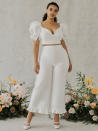 <p>On the hunt for something to wear for your upcoming micro wedding? Look no further than <a href="https://www.alexandragrecco.com/" rel="nofollow noopener" target="_blank" data-ylk="slk:Alexandra Grecco;elm:context_link;itc:0;sec:content-canvas" class="link ">Alexandra Grecco</a>'s Spring/Summer 2022 collection—dubbed "Poppy & Botanica"—for simple, feminine separates and wedding-dress alternatives that exude happiness. While we're partial to the "Imogen" top and pants, seen here, the sweet minis, blazer dresses, and sundress-inspired midi gowns that punctuate the rest of the collection are just as lovely.</p>