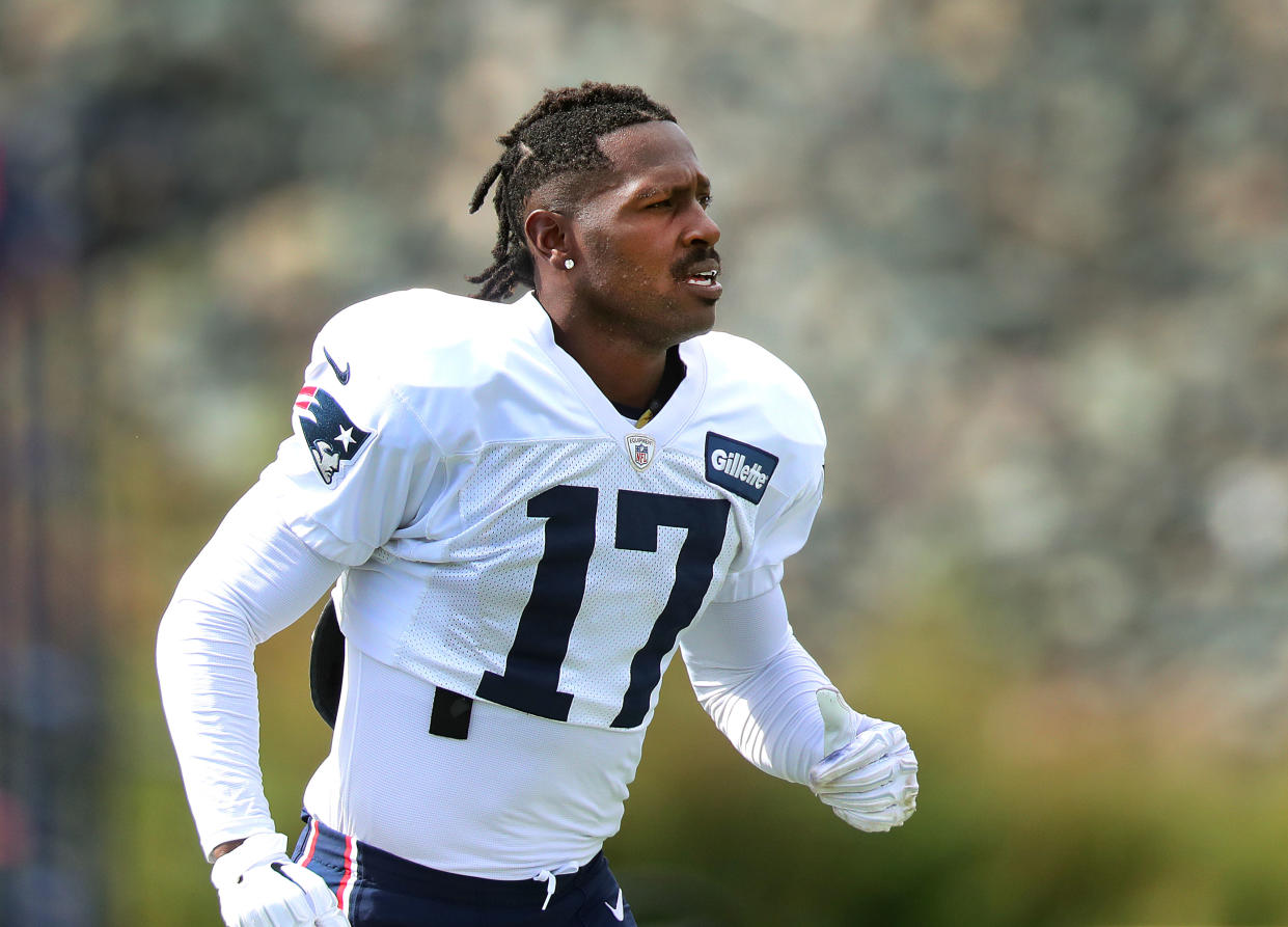 FOXBOROUGH, MA - SEPTEMBER 18: New England Patriots wide receiver Antonio Brown runs onto the practice field during New England Patriots practice at Gillette Stadium in Foxborough, MA on Sep. 18, 2019. (Photo by John Tlumacki/The Boston Globe via Getty Images)