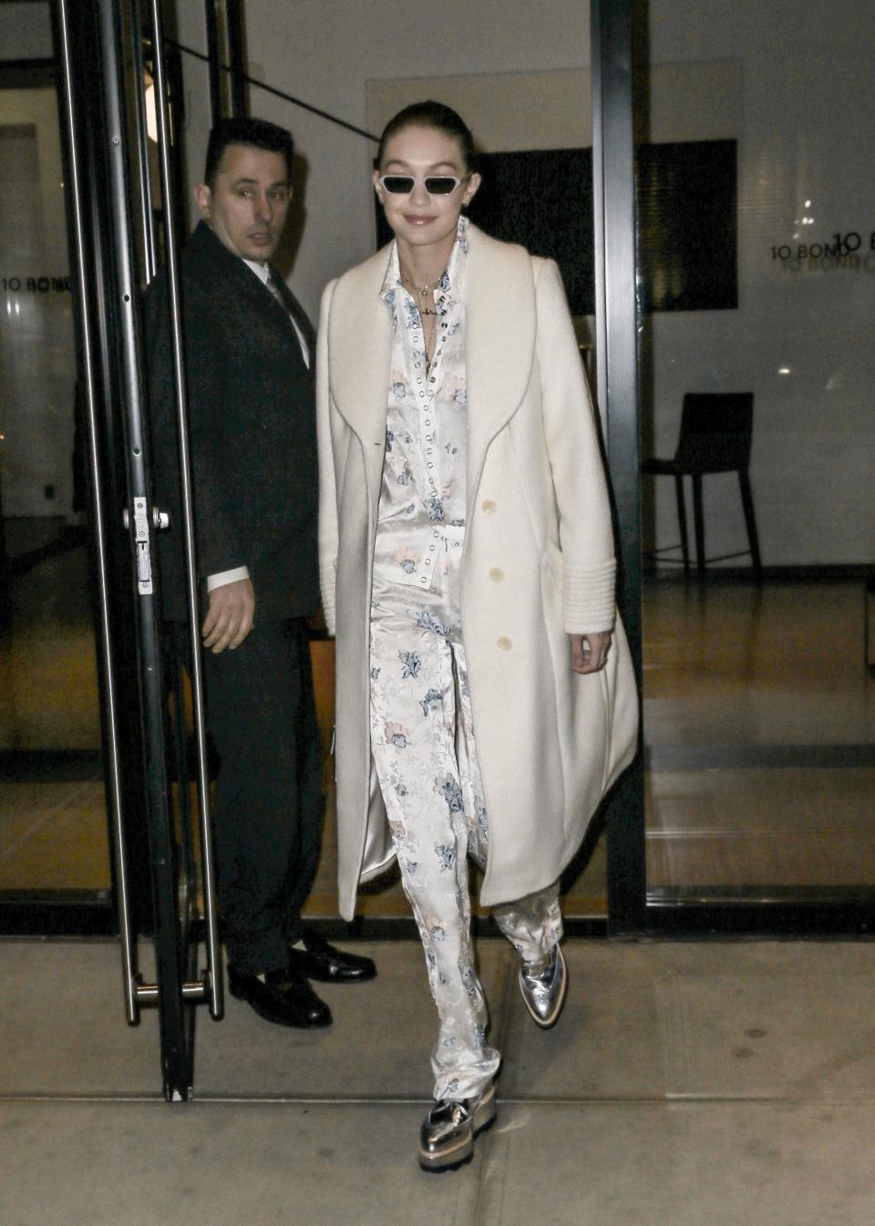 Who: Gigi Hadid<br> What: Sentaler coat, Illesteva sunglasses, Jourden top and trousers, Stalvey bag, Prada shoes<br> Where: On the street, New York City<br> When: February 2, 2018