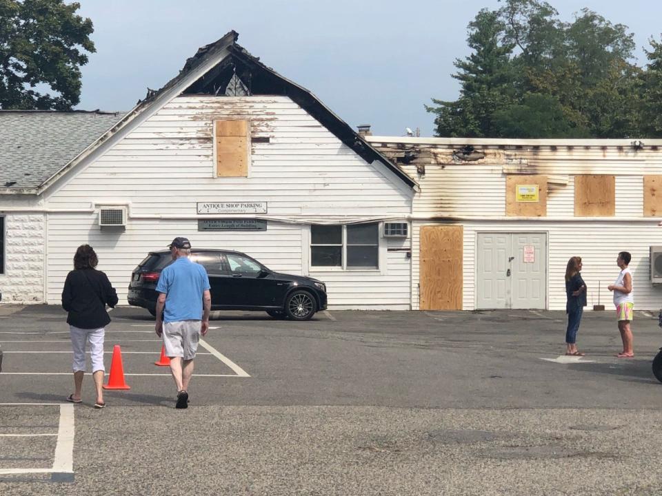 The fire started in the central area of the 12,000-square-foot building and ripped through the roof and caused the second floor to collapse onto the first.