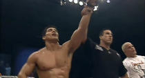 <p>The greatest fight of MMA’s dark era and one of the first true classics of the sport went down at UFC 22 on Sept. 24 in Lake Charles, Louisiana, where Frank Shamrock (L) won a grudge match with Tito Ortiz to retain the middleweight (now light heavyweight title) via submission in a four-round war. (UFC.tv screen shot) </p>