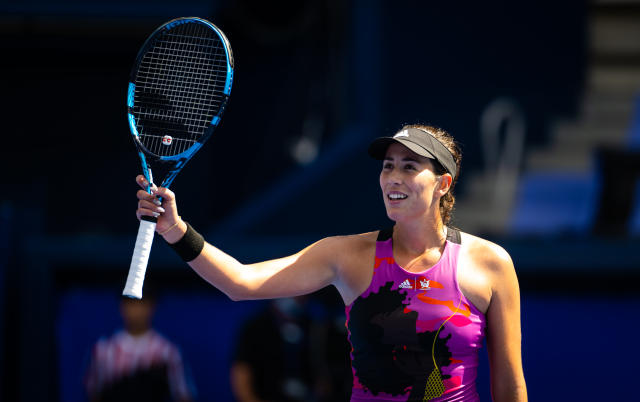 TOKYO, JAPAN - SEPTEMBER 21: Garbine Muguruza of Spain celebrates defeating Despina Papamichail of Greece in her second round match on Day 3 of the Toray Pan Pacific Open at Ariake Coliseum on September 21, 2022 in Tokyo, Japan (Photo by Robert Prange/Getty Images)