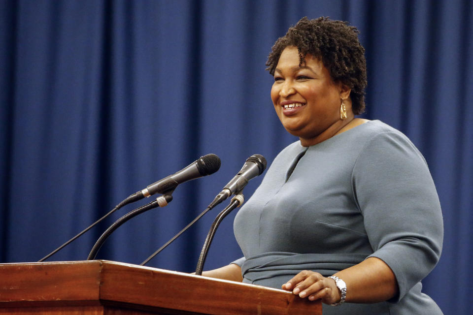 FILE - In this March 1, 2020, file photo, Stacey Abrams speaks at the unity breakfast in Selma, Ala. Many Black voters are skeptical of voting by mail even as states seek to expand that option during the coronavirus pandemic. In 2018, Abrams’ campaign mailed 1.6 million absentee ballot requests to Georgia voters during her unsuccessful bid for governor. The campaign emphasized that it was a safe and easy way to vote. (AP Photo/Butch Dill, File)