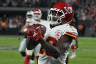 Kansas City Chiefs wide receiver Byron Pringle (13) catches a touchdown pass against the Las Vegas Raiders during the second half of an NFL football game, Sunday, Nov. 14, 2021, in Las Vegas. (AP Photo/Rick Scuteri)