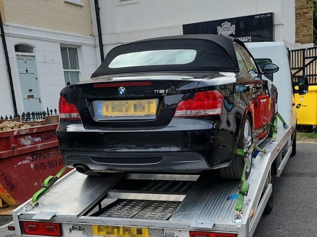 David Tarsh’s BMW being towed away for repair - he says he was offered £2,000 less than the market price by Aviva to fix his BMW (Supplied)