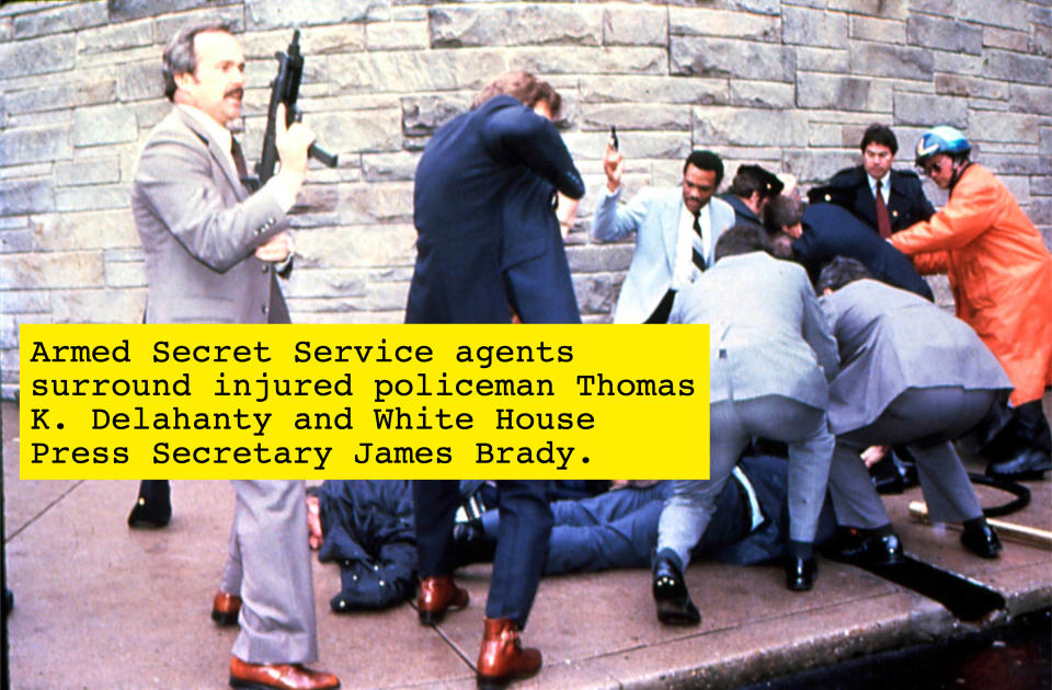 Armed Secret Service agents around the injured policeman Thomas K Delahanty and White House Press Secretary James Brady