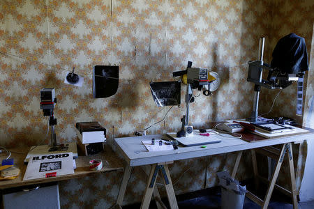 A room used as a darkroom is seen at the Cavallerizza Reale building, which is occupied by the "Assemblea Cavallerizza 14:45" movement in Turin, Italy, July 16, 2016. REUTERS/Marco Bello