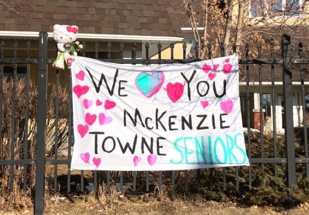 This sign was attached to the fence outside the McKenzie Towne Continuing Care Centre in southeast Calgary as a COVID-19 outbreak swept through the facility in the spring of 2020. 