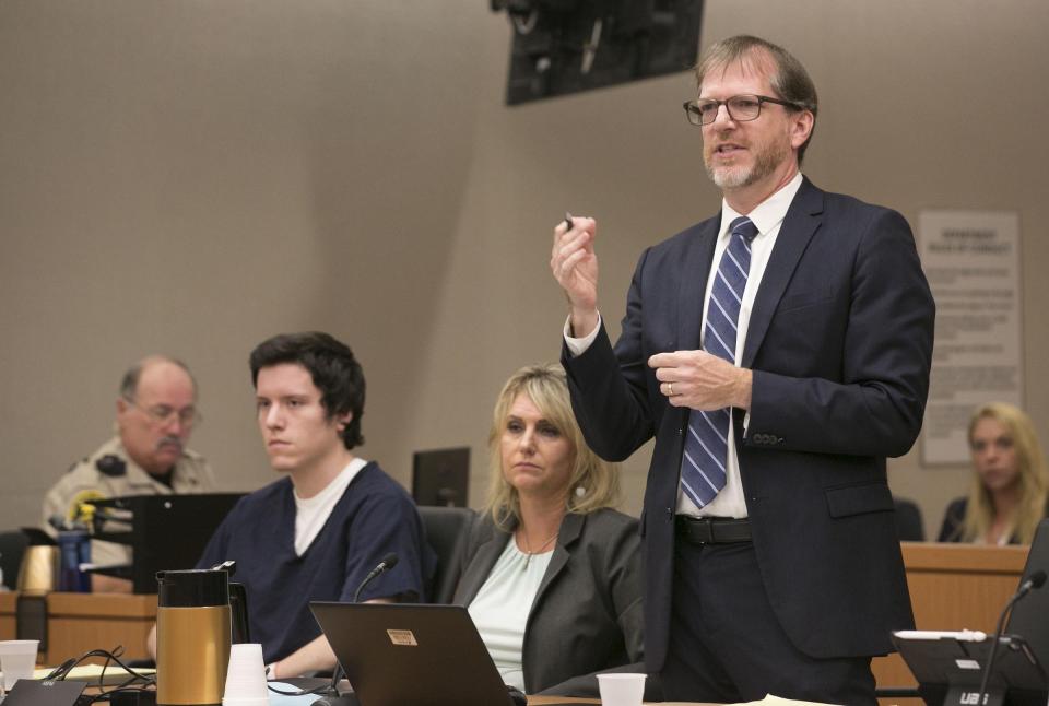 John O'Connell, attorney for John Ernest, left, cross examines witness Oscar Stewart during a preliminary hearing for Earnest, Thursday, Sept. 19, 2019, in Superior Court in San Diego. Prosecutors say Earnest opened fire during a Passover service at the Chabad of Poway synagogue on April 27, killing one woman and injuring three people, including the rabbi. (John Gibbins/The San Diego Union-Tribune via AP, Pool)