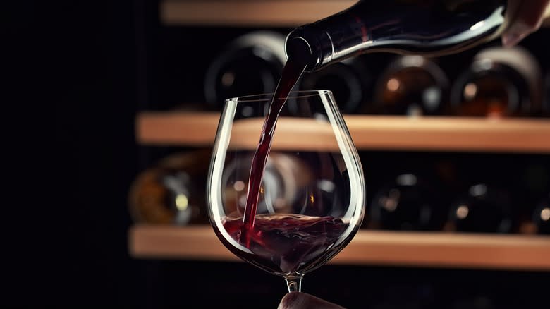 wine being poured into glass