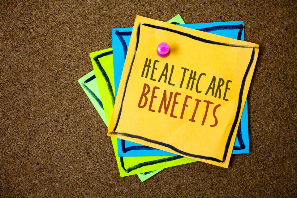 Writing note showing  Healthcare Benefits. Business photo showcasing it is insurance that covers the medical expenses Papers beautiful colours messages feelings card birthday valentine