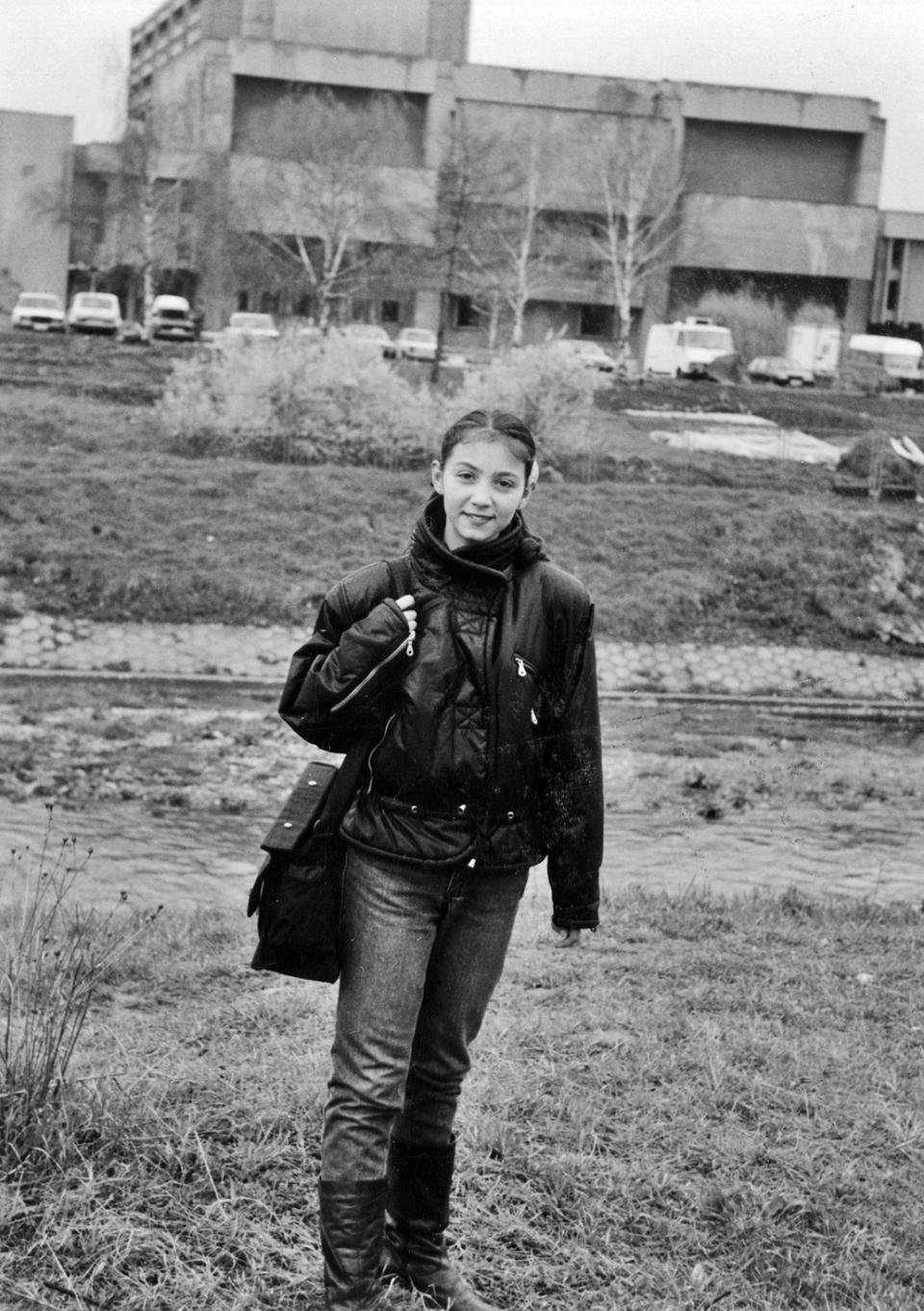 Nadja, at age 14, standing in front of the National Radio TV Station in Sarajevo.<span class="copyright">Courtesy Nadja Halilbegovich</span>