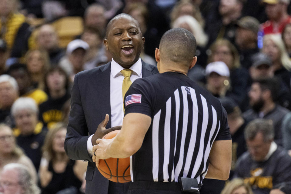 Missouri coach Dennis Gates argues a call with a referee during the first half of the team's NCAA college basketball game against Alabama on Saturday, Jan. 21, 2023, in Columbia, Mo. (AP Photo/L.G. Patterson)