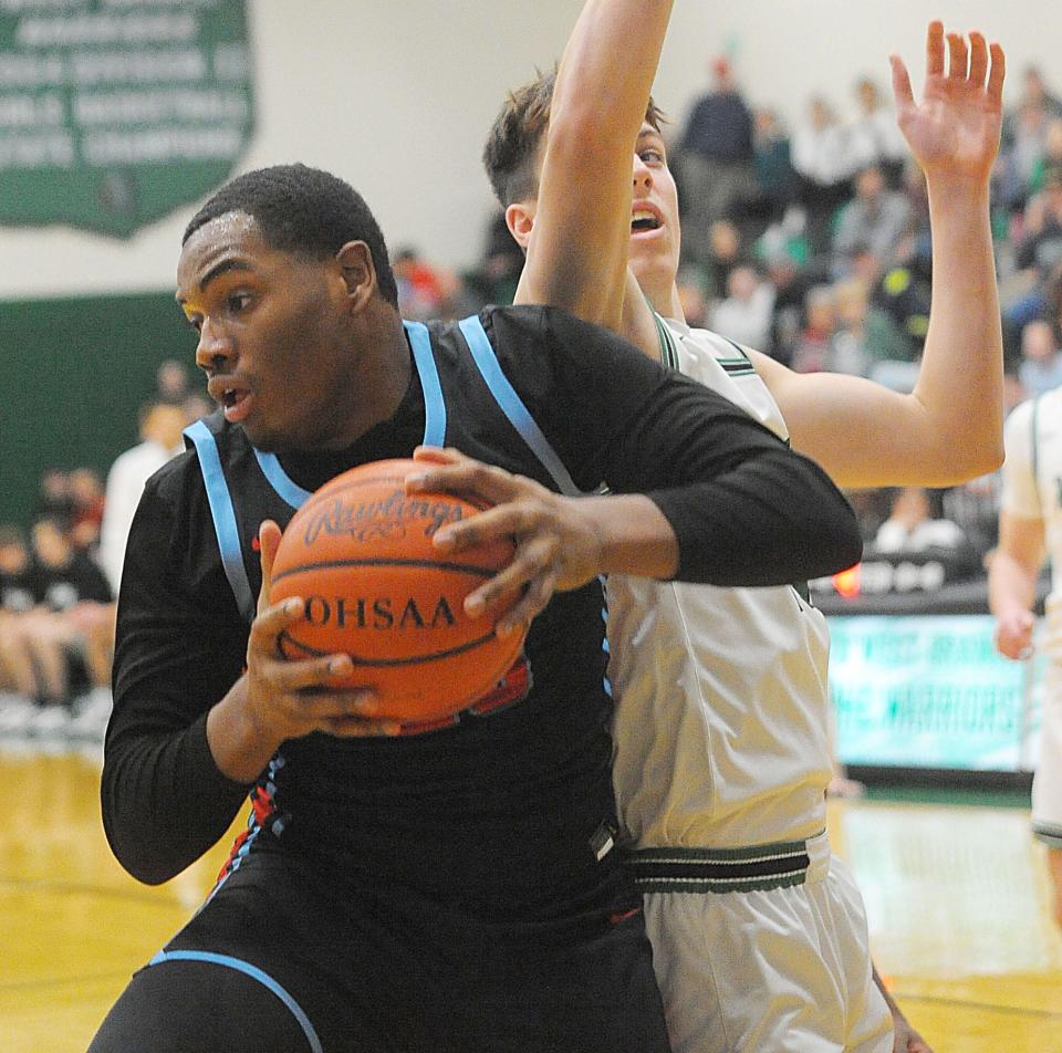 Alliance's Diego Allen collects a rebound at West Branch, Friday, Jan. 27, 2023.