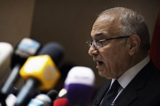 Egyptian presidential candidate and former prime minister Ahmed Shafiq speaks at a press conference in Cairo. Shafiq pledged Saturday to restore the country's revolution