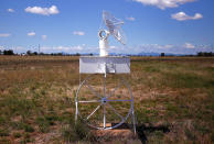 <p>An old wagon wheel and a satellite dish replica serve as a mailbox in the outskirts of Parkes township, northwest of Sydney, Australia. (Photo: David Gray/Reuters) </p>