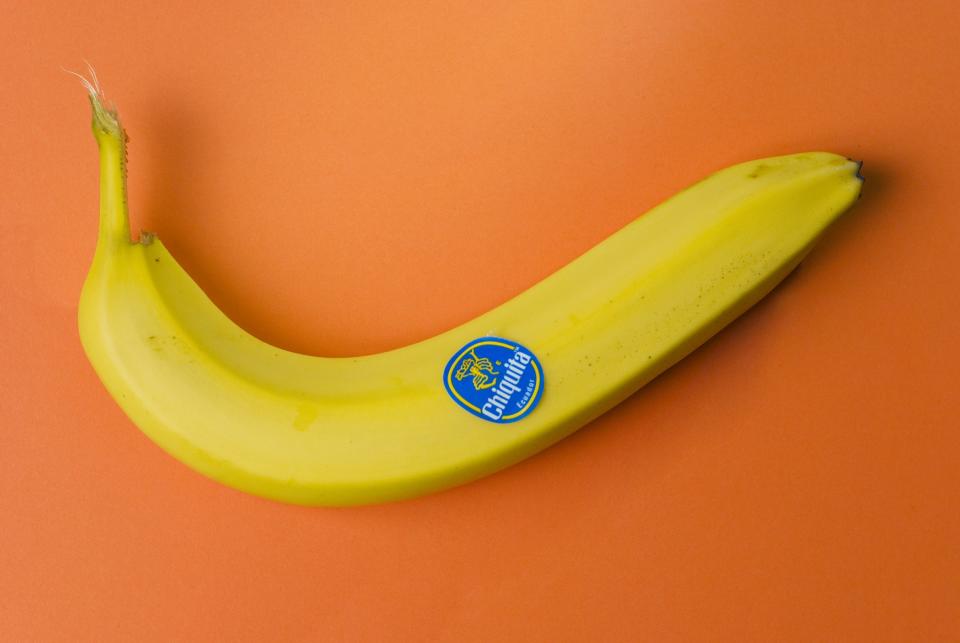 Banana against orange background