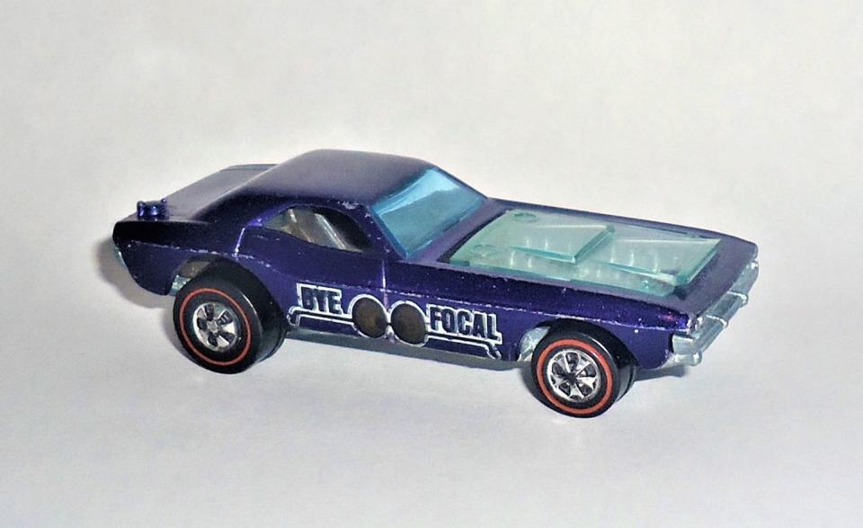 <p>Hot Wheels used numerous shades of blue, purple, and magenta for its models, and it is easy for the novice collector to confuse them all. Bone up on your color-wheel skills and find the purple, because it is the rarest of Mattel's Bye Focal colors. This Spectraflame Purple Bye Focal model is also subject to "crumbling," a condition in which the body or chassis develops cracks and literally begins to crumble. </p>