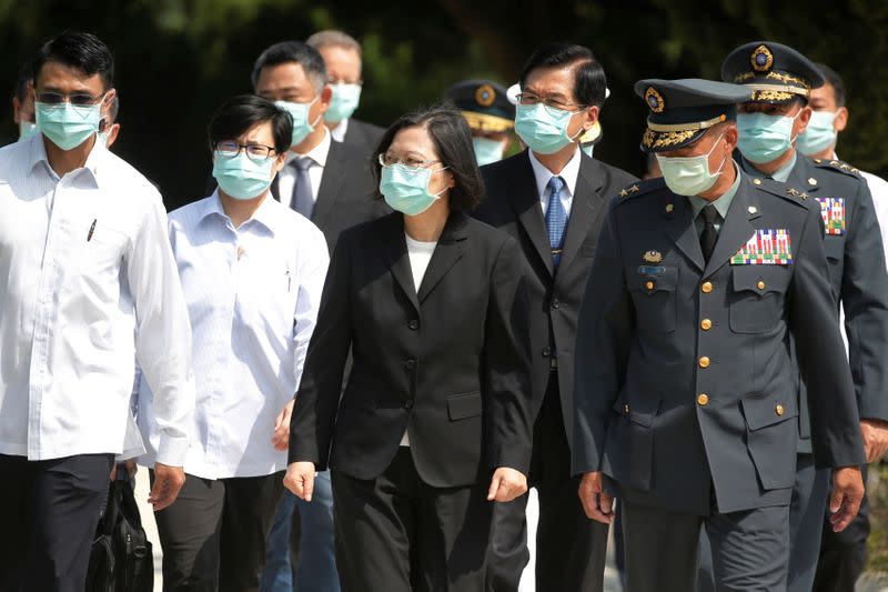 Taiwan's President Tsai Ing-wen leaves after paying her respects to the deceased during an event to mark the 62nd anniversary of the Second Taiwan Strait crisis in Kinmen,