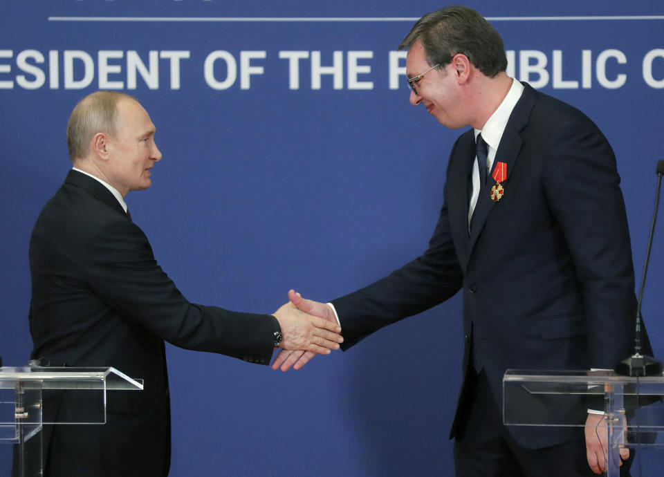 Serbian President Aleksandar Vucic, right, and Russian President Vladimir Putin shake hands after their talks in Belgrade, Serbia, Thursday, Jan. 17, 2019. Putin arrives in Serbia on Thursday for his fourth visit to the Balkan country since 2001. (Maxim Shipenkov/Pool Photo via AP)