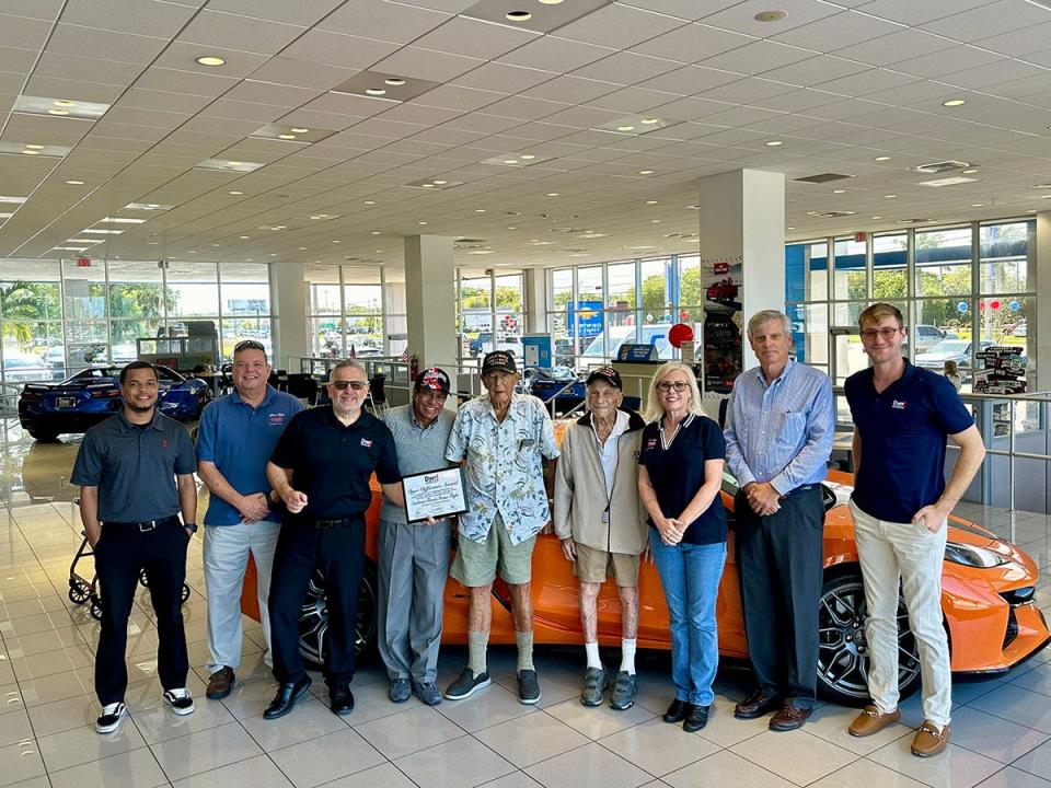 Dyer Sales Associate Josel Infante, Southeast Florida Honor Flight Operations Manager Eric Stein, General Manager Jonathan Holmes, Honor Flight volunteer Dr. Shamsher Singh, WWII Veterans, John Dulo and Ray Glansberg, Southeast Florida Honor Flight Director Christine Brady, Dyer Finance Manager Reese Horstman.