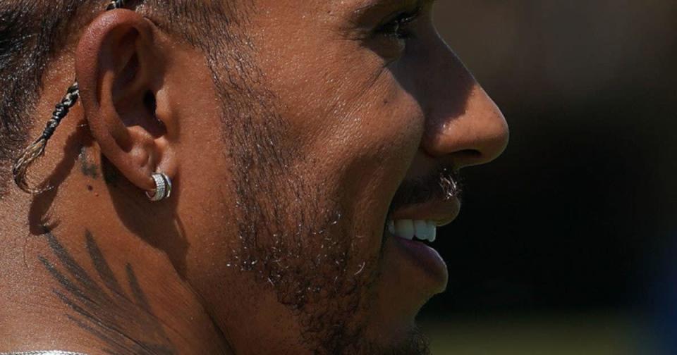 Lewis Hamilton up close earrings. Miami May 2022 Credit: PA Images